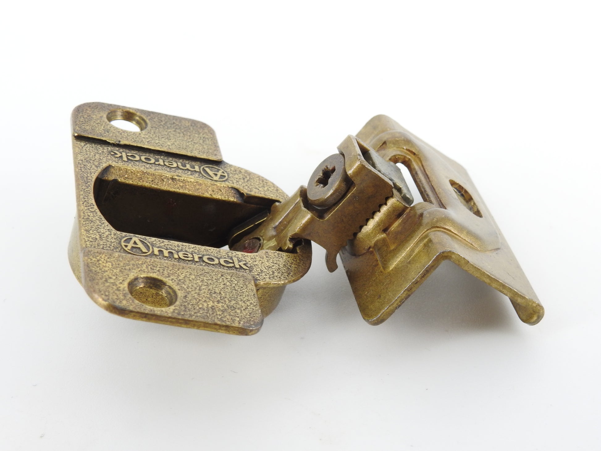 Amerock 2010 hinge in the Burnished Brass finish.  1 1/4" overlay.  45mm drilling boring pattern