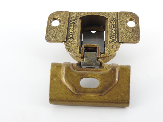 Amerock 2010 hinge in the Burnished Brass finish.  1 1/4" overlay.  45mm drilling boring pattern
