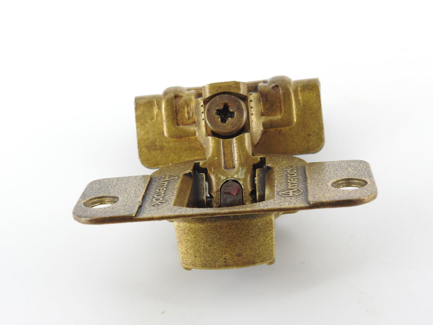 Amerock 2010 hinge in the Burnished Brass finish.  1 1/4" overlay.  45mm drilling boring pattern
