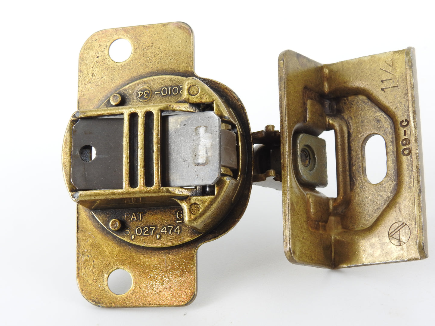 Amerock 2010 hinge in the Burnished Brass finish.  1 1/4" overlay.  45mm drilling boring pattern