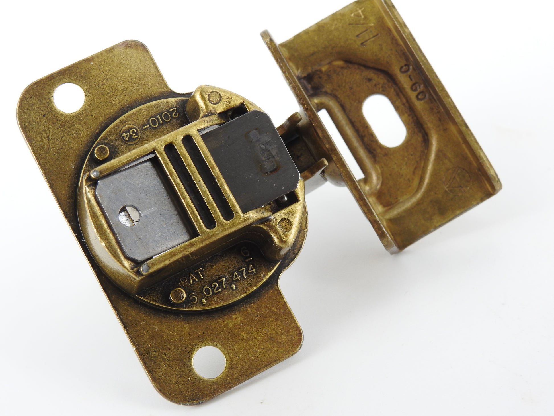 Amerock 2010 hinge in the Burnished Brass finish.  1 1/4" overlay.  45mm drilling boring pattern