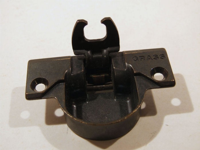 Hingemeister 830 hinge cup in the Bronze finish